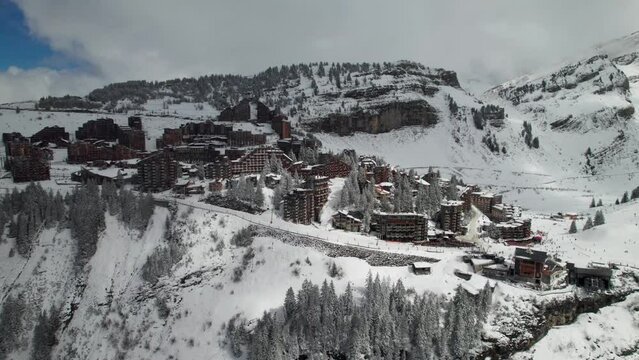 French Alpine ski village in the winter, 4K aerial