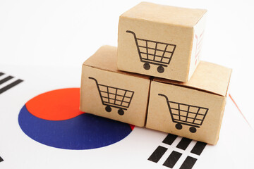 Online shopping, Shopping cart box on South Korea flag, import export, finance commerce.