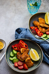 Tasty lunch with raw vegetables and chicken slices