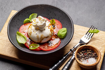 Burrata cheese, tomatoes and basil
