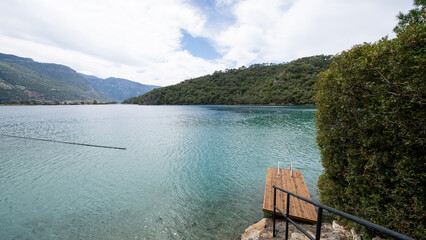 A charming small pier nestled amidst breathtaking nature. 