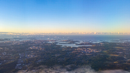 aerial view over Helsinki coastline in Finland in the summer with blue clear sky and the sea