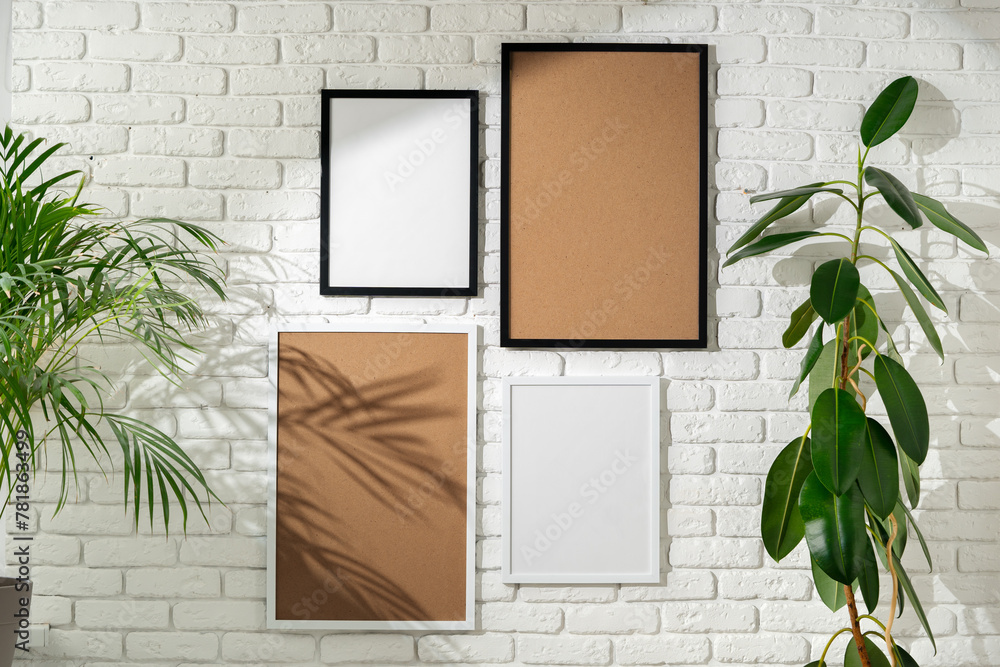 Sticker Varied Sized Photo Frames Displayed on a White Brick Wall