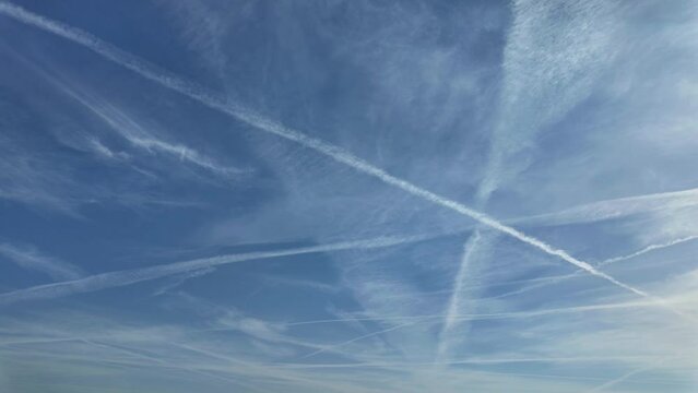 Blue sky with contrails timelapse