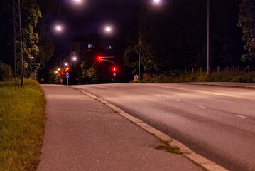 empty street in the night time of tööllö district in Helsinki Finland on a cold winter day without snow
