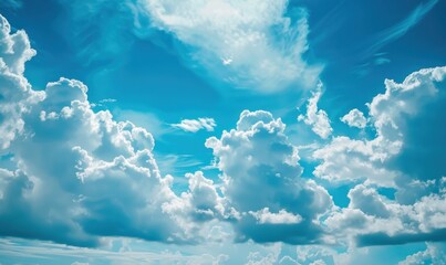 Vibrant Blue Sky Adorned with Fluffy White Clouds