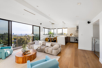Modern Hollywood Hills home living room in Los Angeles, California, with a remodel of an older house