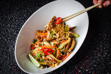 
In the image you can see an Asian dish, Thai seafood salad 