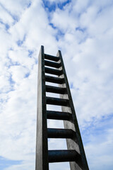 Ladder to heaven. Ladder high up into the sky.

