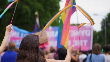 Happy gay pride festival. No stop homophobia concept. Bi girl wave lgbt rainbow flag. Joy people have fun csd fest day. Many lesbian coming out. Same sex lgbtq love party. Queer culture parade protest