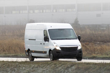 Fast Shipping: Delivery Van of Logistic Company Serving Customers.