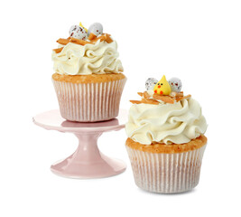 Tasty Easter cupcakes with vanilla cream isolated on white