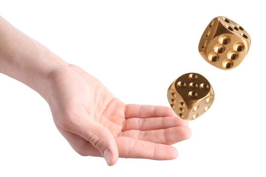 Man throwing golden dice on white background, closeup