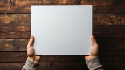 hands holding a white paper notice board mockup 