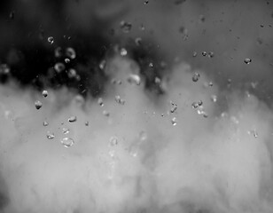 white steam with water droplets as background.