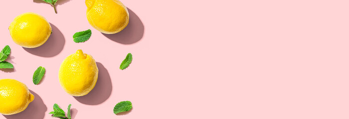 Fresh yellow lemons with mints overhead view - flat lay - Powered by Adobe