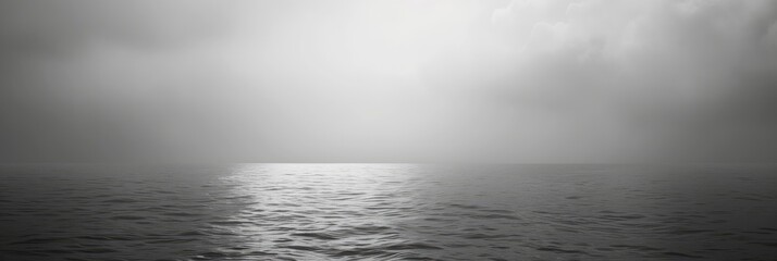 Serene Ocean Horizon on a Misty Day
