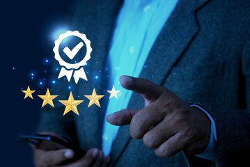 Businessman pointing the best quality assurance with golden five stars for guarantee product....
