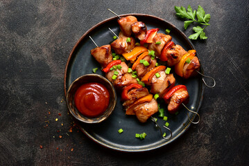 Grilled chicken kebab. Top view with copy space.