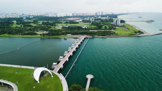 Marina Barrage, Singapore: Aerial view of cityscape and coastline on a overcast afternoon
