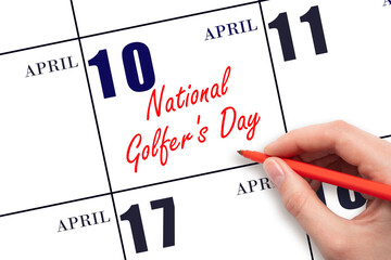 April 10. Hand writing text National Golfer's Day on calendar date. Save the date.