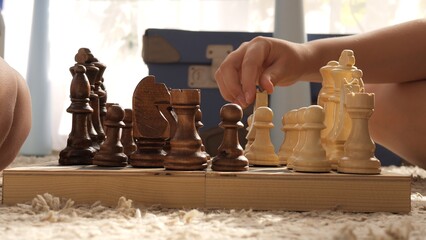 Watch as children compete in chess matches, showcasing skills and determination. Intense...