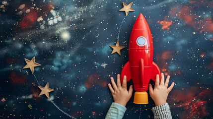Children's hands hold a space rocket on a night background with stars