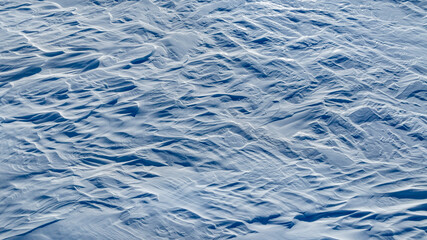 the texture of snow in the tundra from the top
