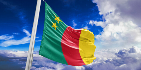 Cameroon  national flag cloth fabric waving on beautiful Blue Sky Background.