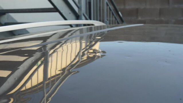 car roof damaged by hail