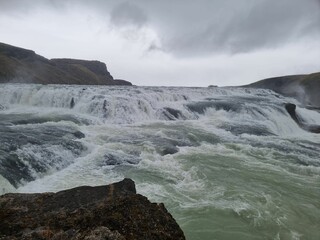 Scenic shot of the Hvita River in Iceland under a cloudy sky