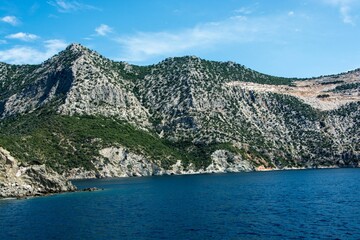 Fototapeta premium Beautiful shot of the blue sea during cruise from Amaliapoli to Skiathos islands in Greece