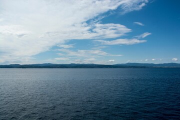 Beautiful shot of the blue sea during cruise from Amaliapoli to Skiathos islands in Greece