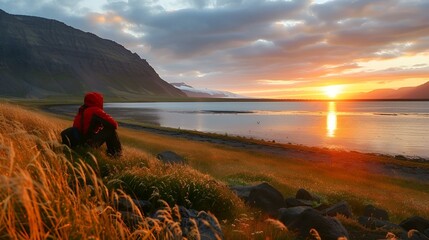 Midnight sun viewing in Iceland, awe-struck travelers - obrazy, fototapety, plakaty