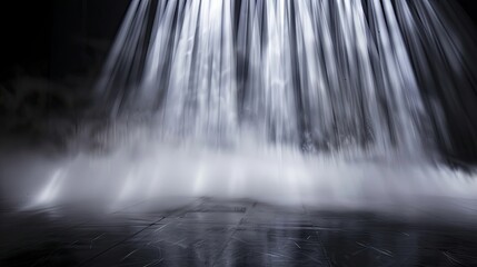 Abstract dance of fog and light on floor with black background