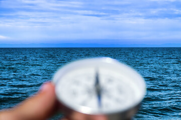 The right compass is always needed for travelers, adequate course. Hiking on the shore of Lake...