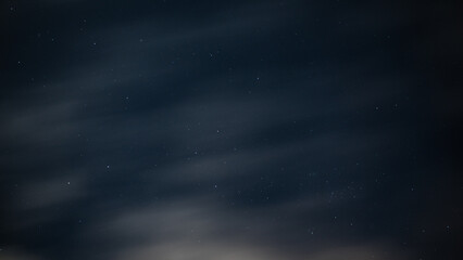 Low angle shot of a long exposure of star sky