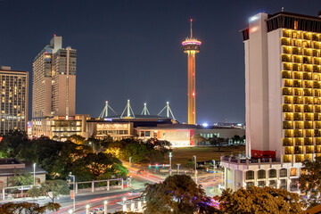 Aerial view of the illuminated buildings of the San Antonio City skyline in Downtown San Antonio...
