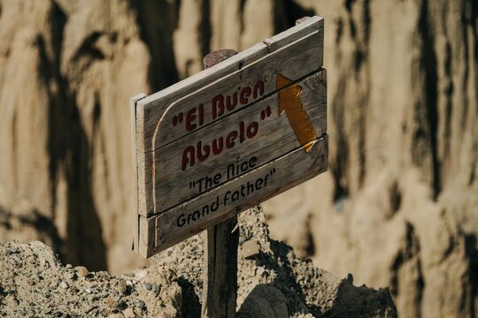 Wooden sign"El Buen Abuelo, the Nice Grandfather" in Valley of Moon (Valle de la Luna), Bolivia