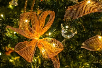 Closeup of beautiful ornaments on a Christmas tree.