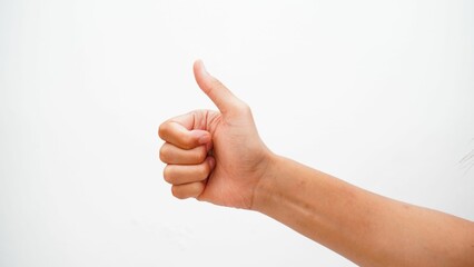 Thumbs up hand gesture isolated on a white background
