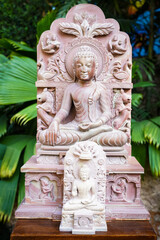 Closeup of a sculpture of an Asian deity