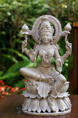 Closeup of a sculpture of an Indian deity