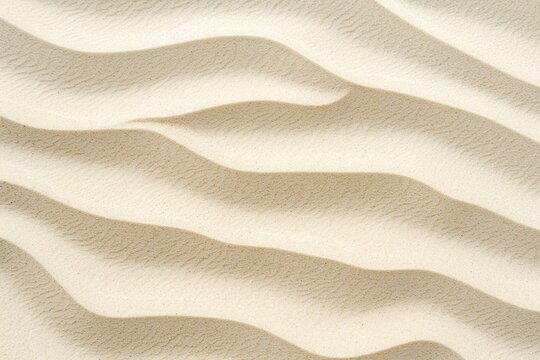 Close-up of smooth beach sand, subtle ripples, soft beige tones