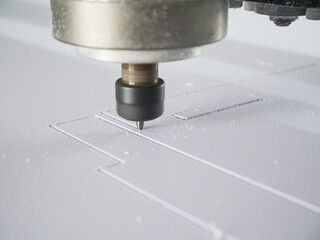 Fototapeta na wymiar Flatbed CNC Machine Working coordinate milling machine for processing plasswood 