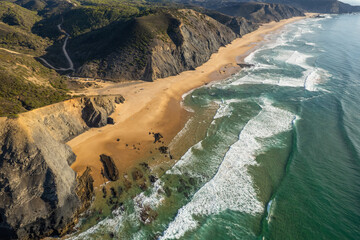 Aerial droe view of beautiful natural Cordoama beach in Portugal Atlantic coast - 781987050