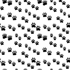 Seamless pattern with different silhouettes of black wild animals, vector