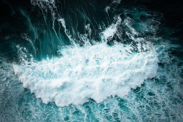 Ocean waves crashing, abstract pattern, top down aerial drone view. - 781988480