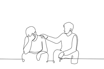 man consoles an upset man sitting next to her - one line art vector. concept man put hand on the shoulder of man who covered eyes with his hand and sits next to him