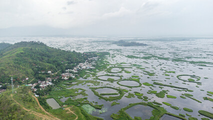 Aerial view loktak lake is the largest freshwater lake and thanga village in India as well as the largest lake in North East India.